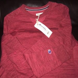Selling a never worn Champion long slv sweatshirt